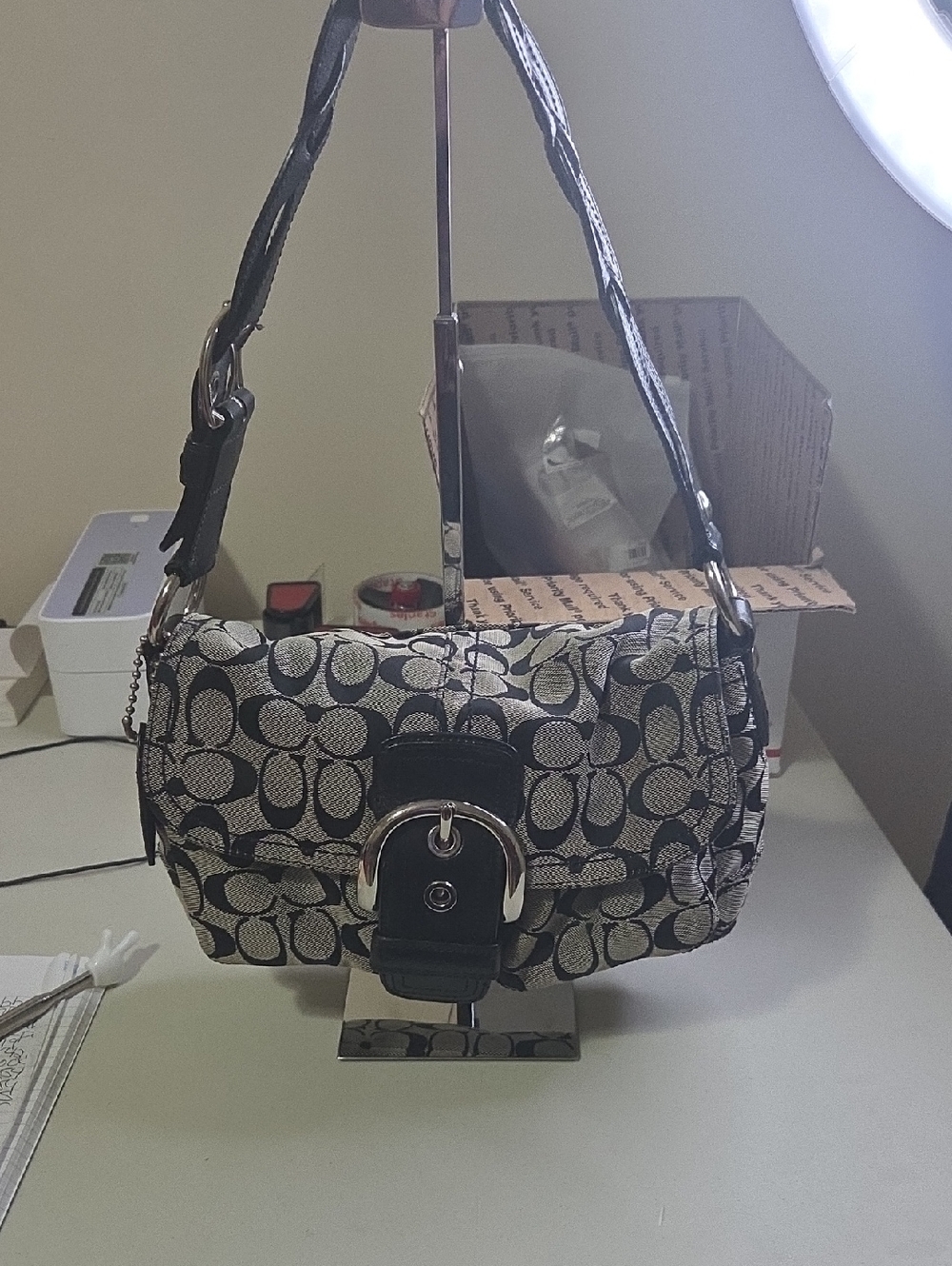 Coach Soho Black and Cream Signature Canvas Shoulder Bag with Buckle Accent